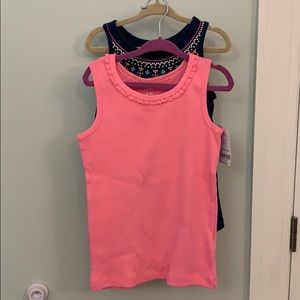 New with tags Carter’s tank tops. Sold as pair